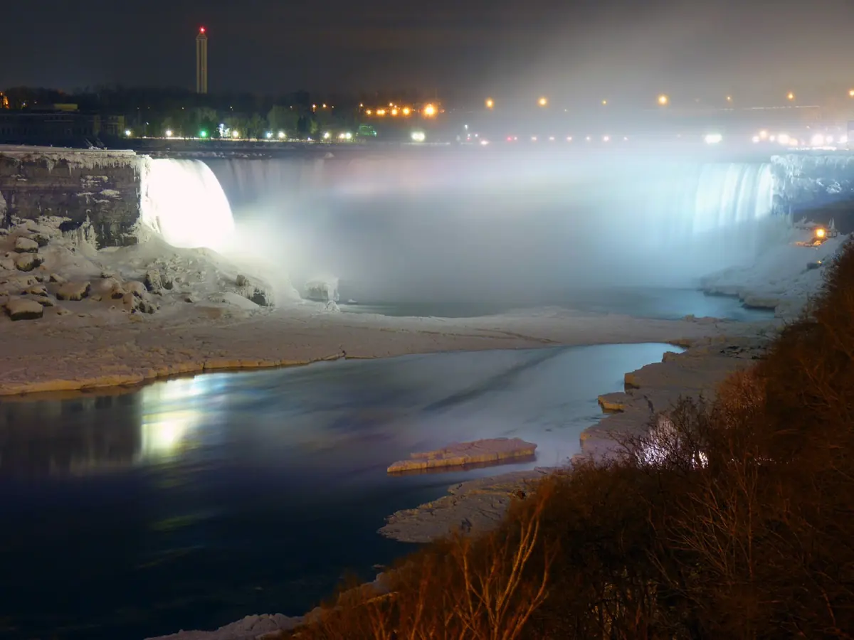 Horseshoe Falls illuminated at night, viewed from the Canadian side